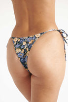 Floral-patterned bikini bottom on a white background