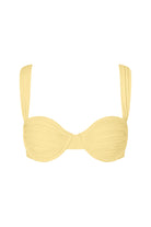 Yellow bikini top with thick straps on a white background