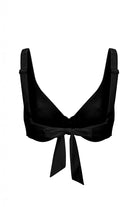 Black bikini top with a bow on a white background