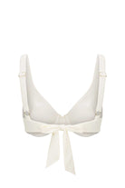 White bikini top with a adjustable detail on a white background