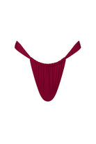 Magenta bikini bottom on a white background