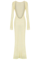 yellow dress with long sleeves and a deep neckline on a white background