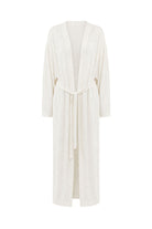 A long-sleeved cream-colored cotton robe with a matching tie belt, displayed on a clean white background.