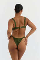 Green bikini set on a white background