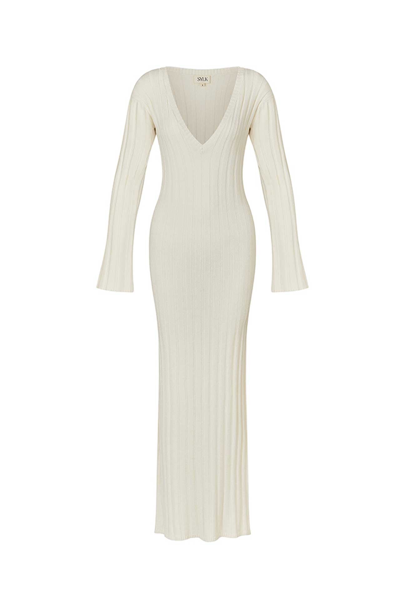 White ribbed dress with long sleeves on a white background