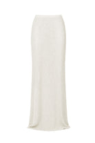 An off-white, textured knit maxi skirt shown flat against a solid white background.