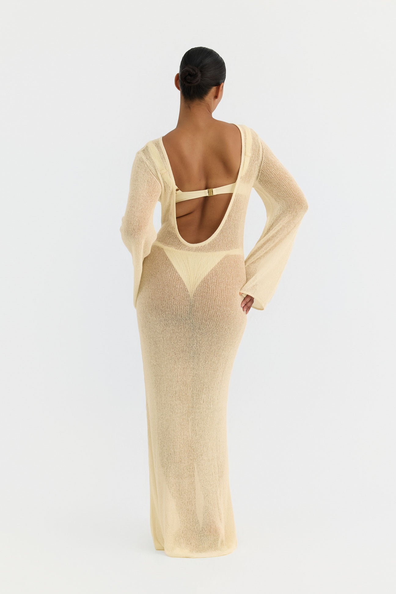 Butter knit dress with open back on a white background