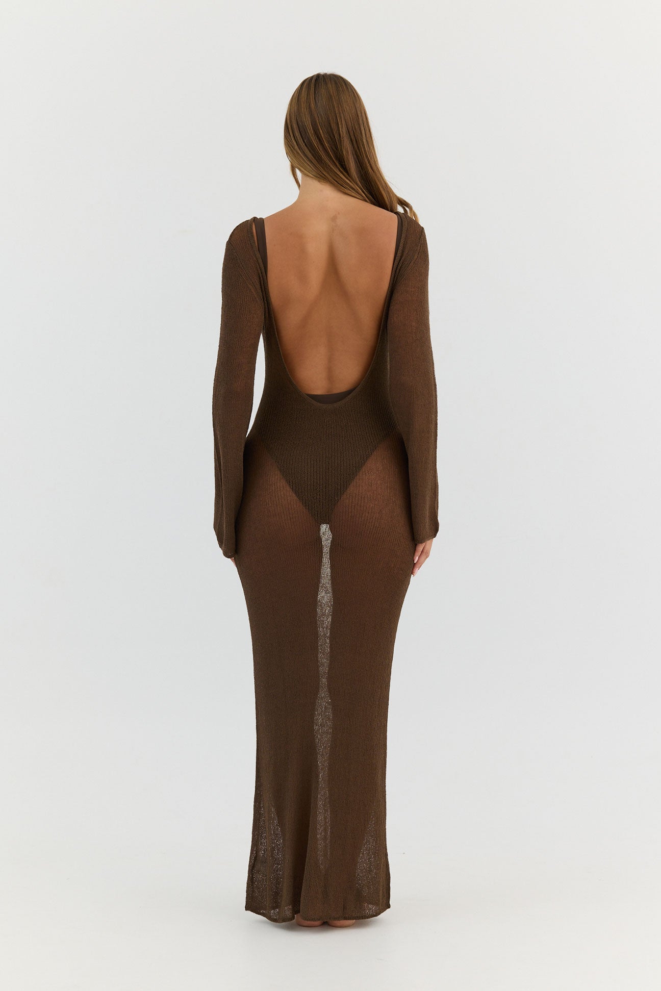 Brown open-back dress on a white background