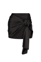 Black wrap skirt with a knot detail on a white background