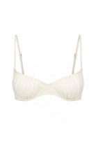 White swimwear top on a white background