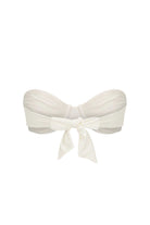 White bandeau bikini top with a bow on a white background