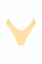 Yellow bikini top on a white background